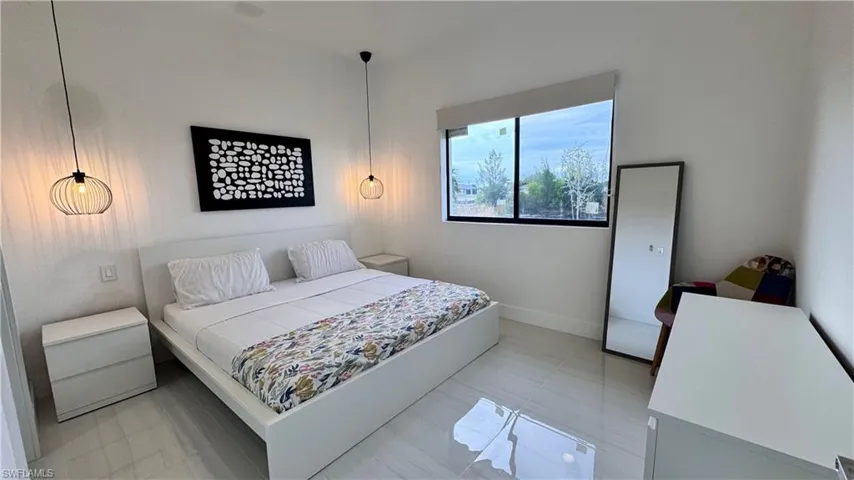 Bedroom with baseboards