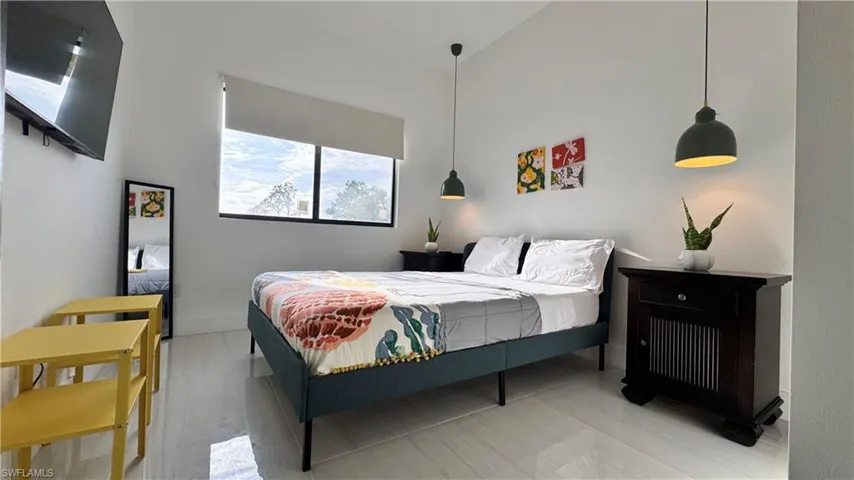 Bedroom with baseboards