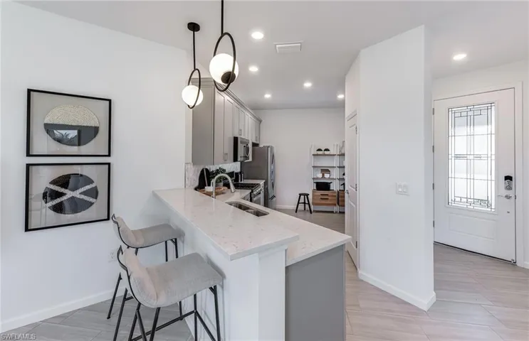 Photos are from a furnished model. Options for this home may vary.