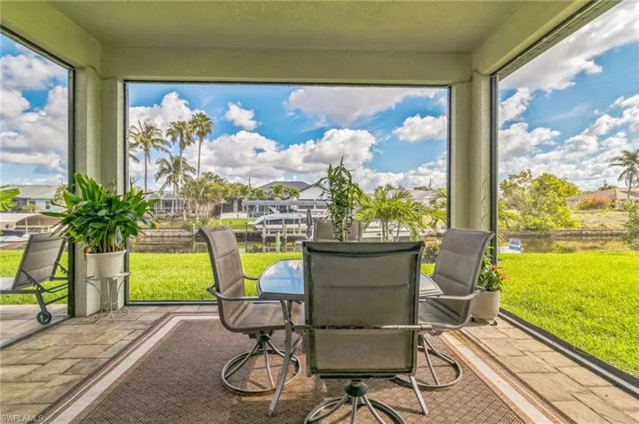 Sunroom with stone tile floors