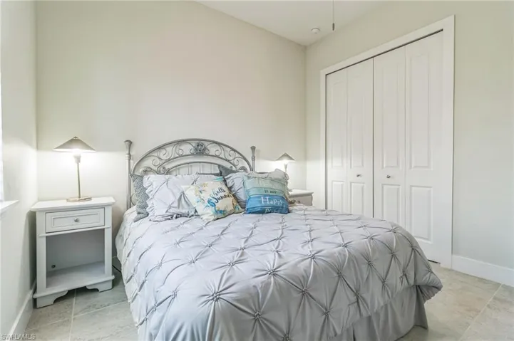 Bedroom with a closet and baseboards