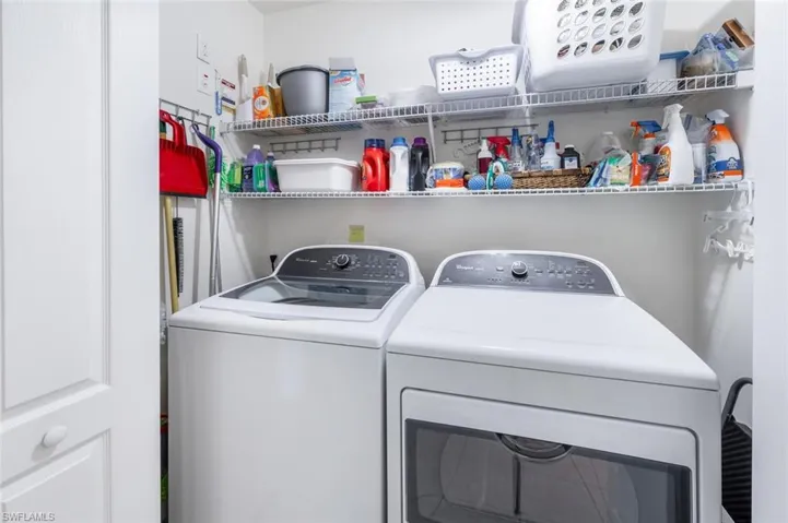 Laundry area featuring washer and clothes dryer