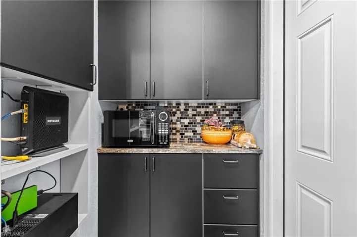 Kitchen with tasteful backsplash