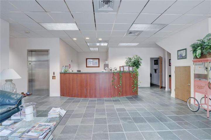 Unit #3 reception area with outstanding buildouts and elevator.