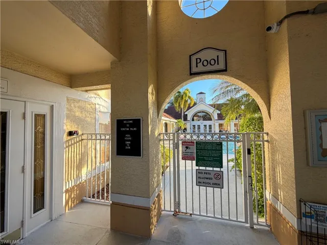 Community pool featuring a patio area and french doors