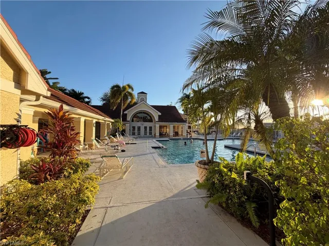 Community pool featuring a patio and french doors