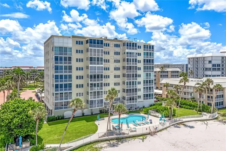 View of property with a community pool