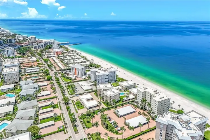 Aerial view with a view of the beach and a water view