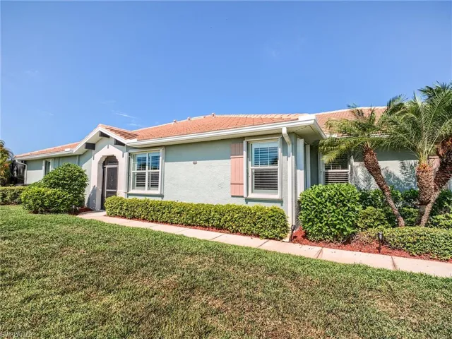 Ranch-style home with a front yard