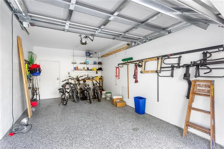Epoxy floor, electric garage door, and additional back door to the garage.