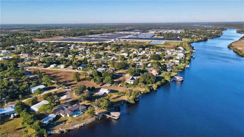 Aerial view from the East looking down the Caloosahatchee River toward the Gulf.