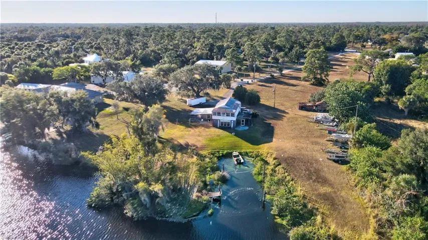 UNUSUAL opportunity to have your own PRIVATE YACHT BASIN on the Caloosahatchee River.