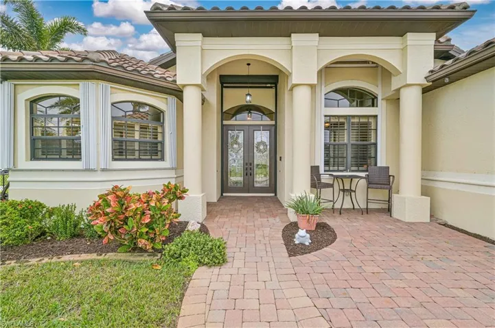 Entrance to property featuring french doors