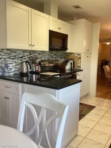 225  Belle Isle  CIR, Naples, FL 34112