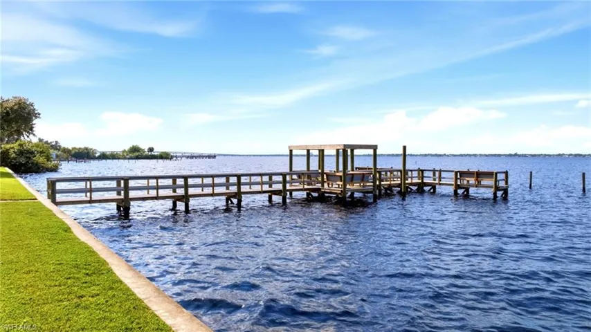 Community fishing pier and boat dock on the river