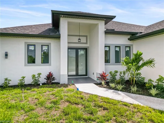 Entrance to property featuring french doors