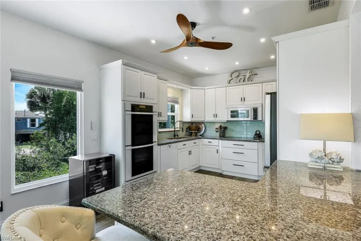 View of kitchen from formal dining area.
