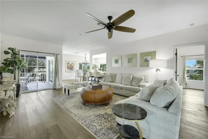 Overlooking the river, canal and the pool/lanai area, the great room is simply stunning - SO light and bright!