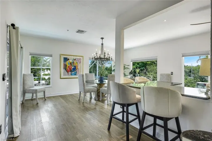 View of kitchen and dining from living room.