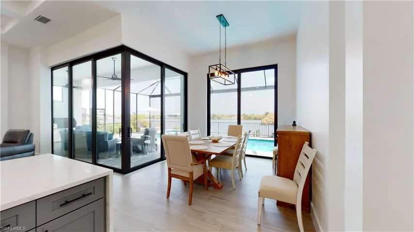 Dining area featuring light wood finished floors