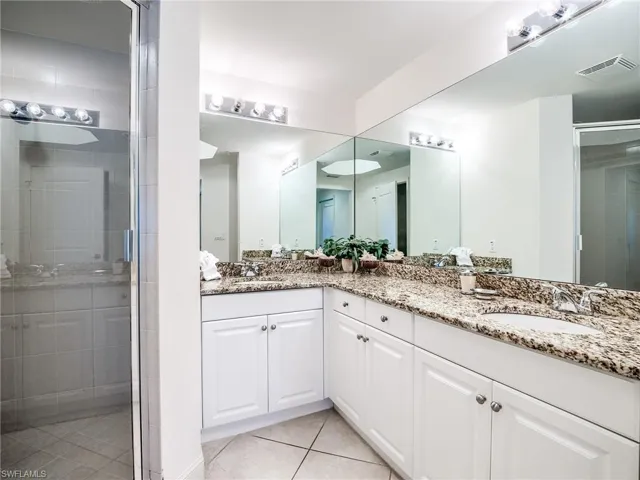 Dual Vanity, Large Shower & Private Commode!
