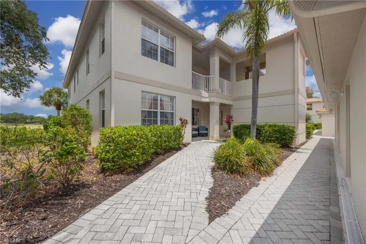View of front of house featuring stucco siding