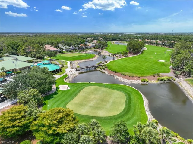 Bird's eye view of a large body of water and a local golf course