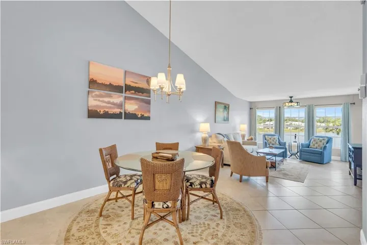 Dining/living room with volume ceilings