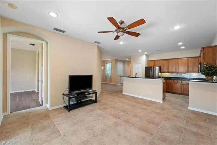 Living Room, door to Primary and Kitchen