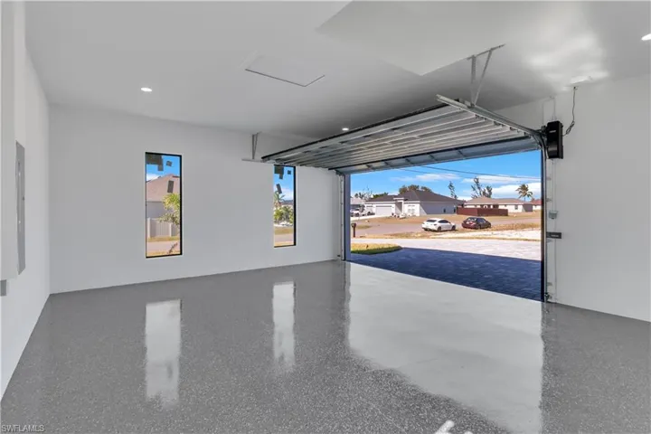 Garage featuring electric panel