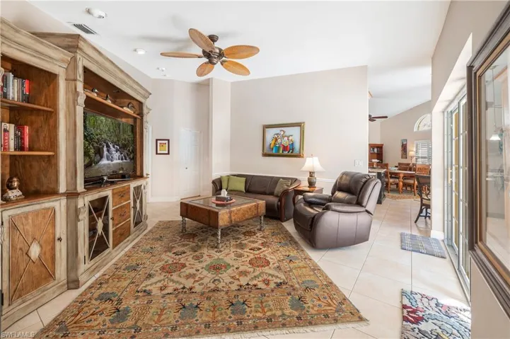 Tiled living room with ceiling fan