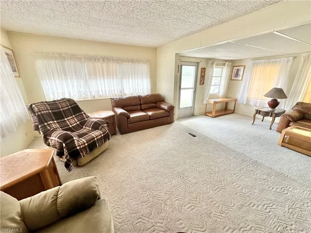 Living room with carpet flooring