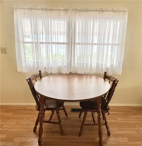 Dining space featuring light hardwood / wood-style flooring