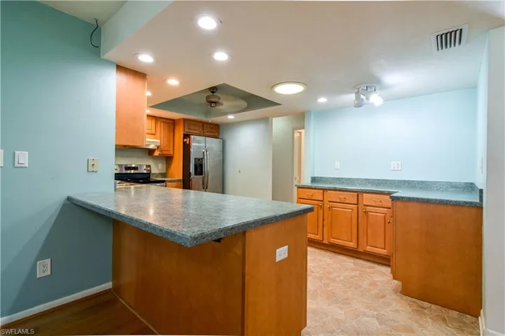 With Breakfast bar into Great Room