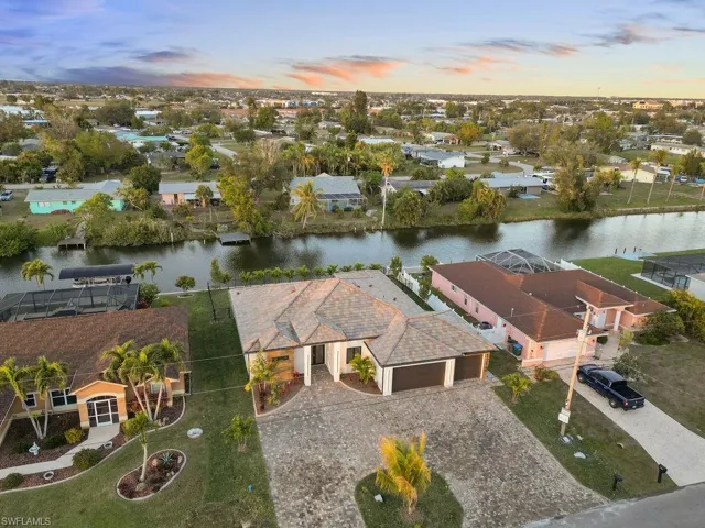 Aerial view at dusk with a water view