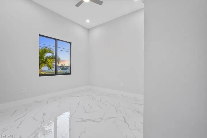 Spare room featuring ceiling fan