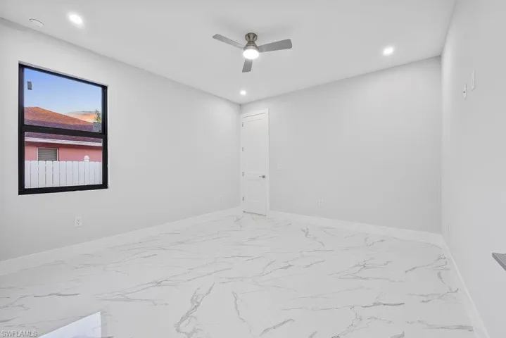 Unfurnished room with ceiling fan