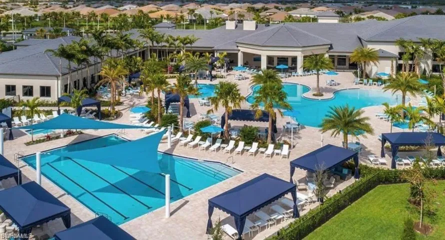Community pool featuring a patio