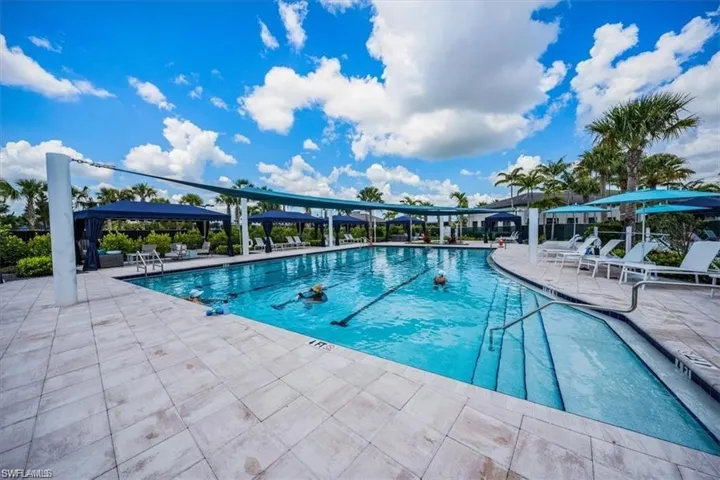 Community pool featuring a patio area