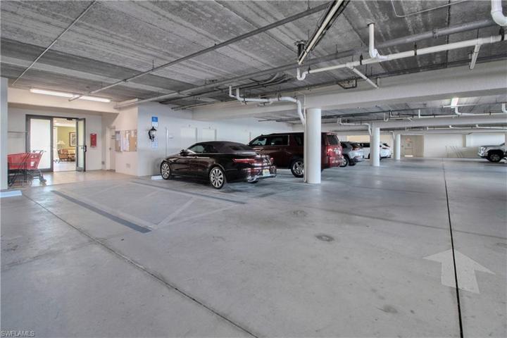Two assigned parking places and a storage closet convey with condo