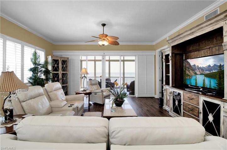 This end unit offers wrap-around waterfront views