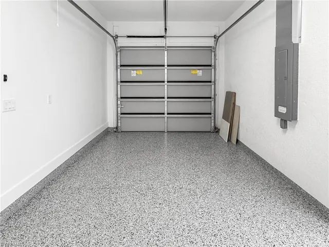 Garage featuring electric panel