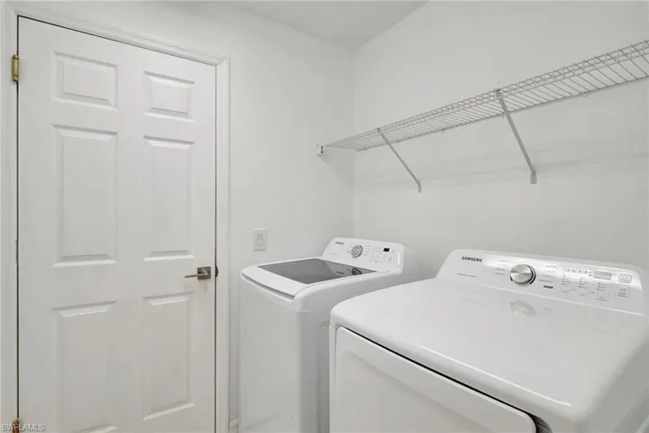Laundry room with separate washer and dryer