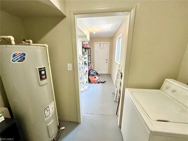 Laundry and stroage room with outdoor access.