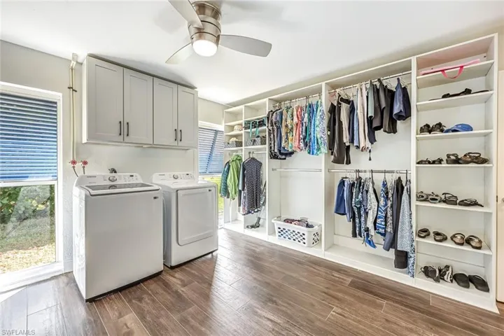 Walk-in Closet with Custom Cabinets and Waher/Dryer