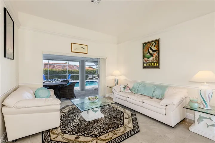 Living room with lofted ceiling
