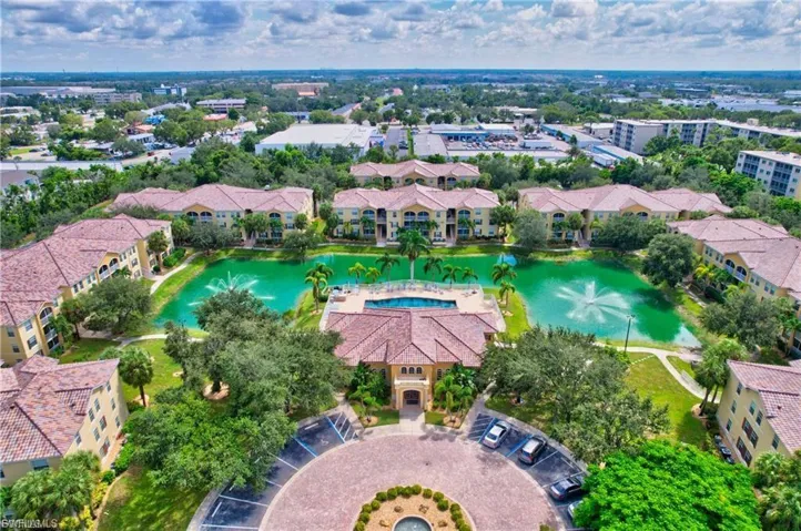 Aerial view of property's location featuring a large body of water