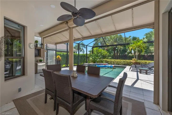With awning and electric hurricane shutters
