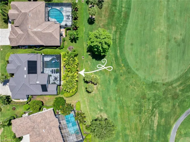 Home sits on expansive south facing green space at hole #6