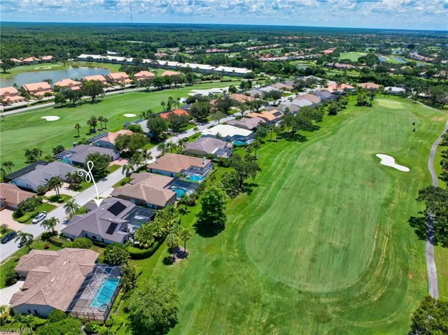 Home sits on expansive green space with perfect views of hole #6 fairway